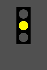 The same stoplight with the middle lamp bright yellow and the other two dark gray