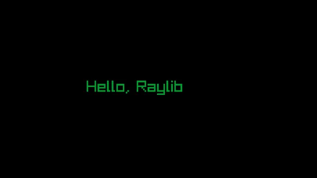 A 640 by 360 black window with the words Hello, Raylib in green near the center